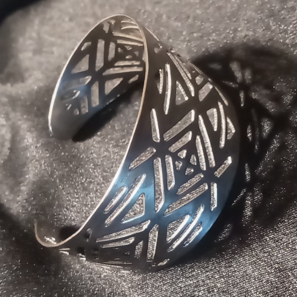 Silver tone cuff bracelet Aztec design